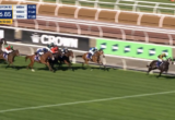 Horses sprinting a Flemington race, lead group near the finish with 120m to go and a 1:16.85 timer on screen.