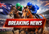 Breaking News banner stretches across a dramatic horse race as two jockeys race front-on on a muddy track, kicking up dirt with an Australian flag in the background