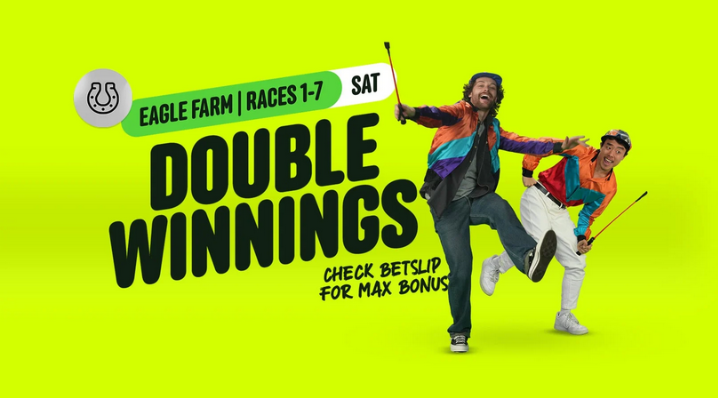 Bright yellow promo banner for Eagle Farm races: large 'DOUBLE WINNINGS' text with two men jumping, and small notes 'Eagle Farm | RACES 1-7 | SAT' and 'Check BetSlip for max bonus'