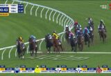 Horse race on a turf track with a large pack of jockeys and horses rounding a bend; on-screen text shows Randwick R9, 400m to go, and split times (1000m, 800m, 600m). Bottom scoreboard lists 1st Whinchat (11) 19.00, 2nd Cool Jakey (8) 5.00, 3rd General Salute (3) 8.00, 4th Amor Victorious (5) 34.00, 5th Midnight Dynamite (12) 2.60, 6th Williamsburg (16) 71.00.