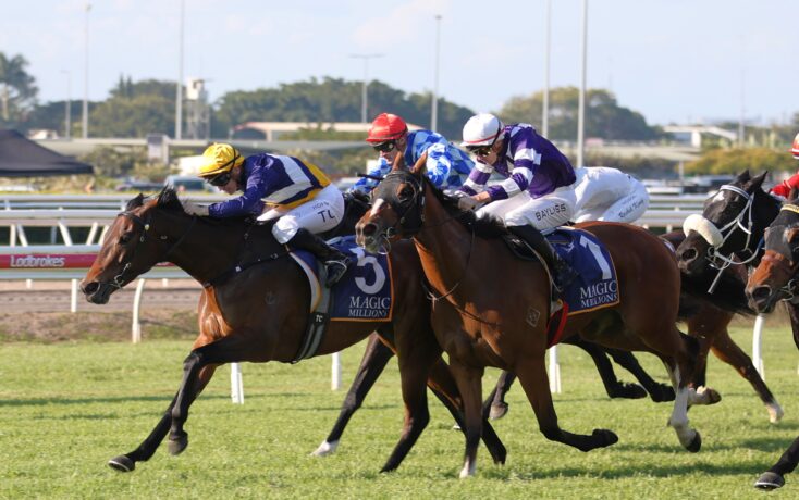 Jockeys in colorful silks racing on thoroughbred horses along a turf track under bright skies, close-packed sprint.