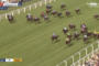 Group of horses racing on a green turf track during a live Royal Ascot broadcast, with jockeys in colorful silks and spectators in the stands nearby.]","Horse race at Royal Ascot: multiple horses sprint along a sunlit turf course with white rails and cheering crowd.]","Live horse race scene: pack of Thoroughbreds and jockeys in bright silks racing down the track, stands full of spectators at the side.]","Aerial view of a horse race on grass with several horses and jockeys in blue, red, and yellow silks racing toward the left.]","Horse race action on a turf course, live broadcast logo, time and speed overlays visible as jockeys push their mounts hard.